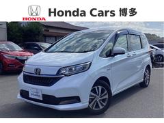 フリードハイブリッド ハイブリッド・Gホンダセンシング ナビゲーション ドライブレコーダー前後 ETC 両側パワースライドドア LEDヘッドライト+アクティブコーナリングライト センターテーブル オートリトラミラー 軽減ブレーキ キーフリーシステム 記録簿 中古車画像