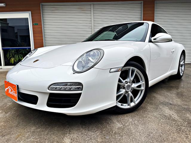 ９１１カレラ　９９７．２　左ハンドル／ＰＤＫ／スポーツクロノパッケージ／スポーツエグゾースト／純正ナビ／バックカメラ／ＥＴＣ／ＨＩＤライト／ＬＥＤテールランプ／純正１８インチアルミ／前後ドラレコ／レーダー探知機(1枚目)