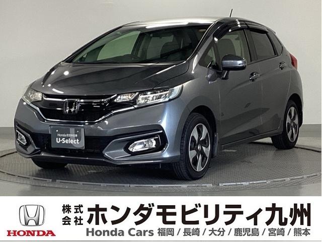 フィットハイブリッド Ｌホンダセンシング　純正メモリーナビ　ドラレコ　リアカメラ　軽減ブレーキ　Ｒカメ　ＬＥＤ　サイドＳＲＳ　横滑り防止　ドライブレコーダー　フルセグテレビ　記録簿　ナビＴＶ　パワーステアリング　盗難防止装置　オートクルーズ（1枚目）