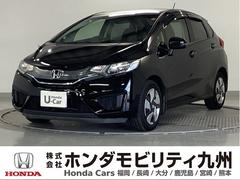 フィットハイブリッド Fパッケージ 純正メモリーナビ リアカメラ ETC 盗難警報装置 記録簿有り AUTOエアコン 助手席エアバック ECON リヤカメラ ABS付 DVD視聴 横滑り防止システム キーレスエントリー 運転席エアバック 中古車画像