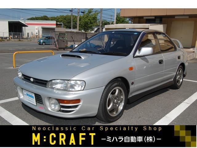 インプレッサ ＷＲＸ　ＳＴｉバージョン　Ｖｅｒ．　Ｉ　４ＷＤ　純正アルミホイール　５速ＭＴ　エアコン　パワーステアリング　パワーウィンドウ　ナビ　ＥＴＣ（1枚目）