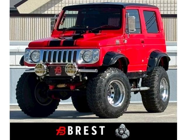 ジムニー(スズキ) ワイルドウインド　５速ＭＴ車／リフトＵＰ／オーバーフェンダー／ＡＭＰホイール／ＳＵＰＥＲ　ＯＦＦ　ＲＯＡＤＥＲ（スーパ―オフローダー）フォグカバー／ＡＬＥＸ製シャークデザインステアリング／シートカバー 中古車画像