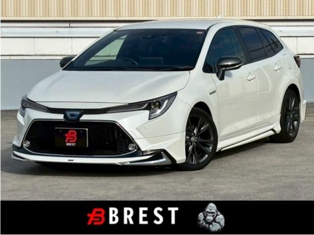 カローラツーリング(トヨタ) ハイブリッド　ダブルバイビー　モデリスタエアロ／ＴＯＭ‘Ｓマフラー／純正ディスプレイオーディオ／Ｂｌｕｅｔｏｏｔｈ／フルセグＴＶ／バックモニター／ＣＤ／ＤＶＤデッキ／ドラレコ／純正１６インチＡＷ 中古車画像