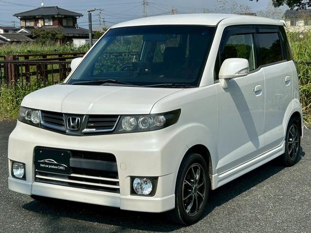 ゼストスパーク Ｗ　ドライブレコーダー・バックカメラ・ナビ・オーディオ・アルミホイール・スマートキー・キーレス・電動格納ミラー・オートエアコン・フロントフォグランプ・フルフラットシート（1枚目）