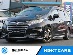 オデッセイハイブリッド ハイブリッドアブソルート・EXホンダセンシング 純正9インチナビ・フルセグTV・フリップダウン後席モニター・HDMI対応・Bluetooth・レザーシート・両側電動スライドドア・HIDヘッドライト・シートヒーター・ドライブレコーダー・ETC2.0 中古車画像