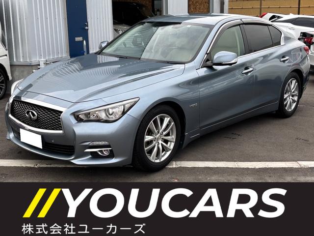 スカイライン(日産) ３５０ＧＴ　ハイブリッド　タイプＰ　ワンオーナー　禁煙車　ベージュレザーシート　コネクトナビＴＶ　アラウンドビューモニター　レーダークルーズ　レーンキープ　シートヒーター　ビルトインＥＴＣ　ドライブレコーダー　純正１７ＡＷ　ＬＥＤライト 中古車画像