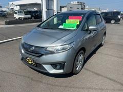 フィットハイブリッド Fパッケージ プシュスタート・スマートキー・アルミホイール付き 中古車画像