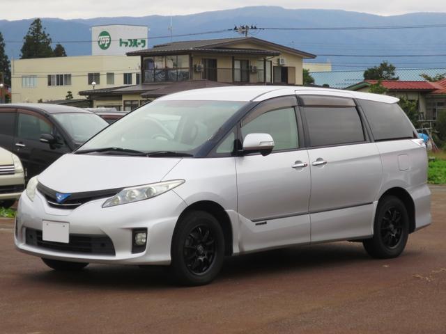 エスティマハイブリッド(トヨタ) Ｘ　４ＷＤ　電動スライド　ナビ　バックカメラ　３列シート　ＡＣ１００Ｖ　プッシュスタート　ＥＴＣ　オートエアコン　オートライト　アルミホイール 中古車画像