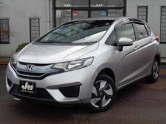 フィットハイブリッド Fパッケージ ハイブリッド バックカメラ ナビ スマートキー 電動格納ミラー AT チップアップシート ESC エアコン パワーステアリング パワーウィンドウ 運転席エアバッグ 助手席エアバッグ 中古車画像