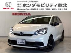 フィット e:HEVホームブラックスタイル 中古スタッドレスタイヤ、純正メモリーナビ、ドライブレコーダー前後装着+ETC付 当社デモカー Bカメラ ドラレコ アイドリングストップ オートクルーズコントロール LEDヘッドランプ 4WD フルセグ 中古車画像