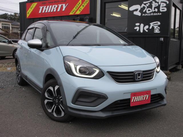 フィット(ホンダ) ｅ：ＨＥＶクロスター　４ＷＤ　寒冷地仕様　純正ＳＤナビＴＶ　ビルトインＥＴＣ　衝突軽減ブレーキ　バックカメラ　追従クルコン　前後ドラレコ　ＬＥＤライト　ＢＴ接続　プッシュスタート　車線逸脱警報　純正１６ｉｎアルミホイール 中古車画像