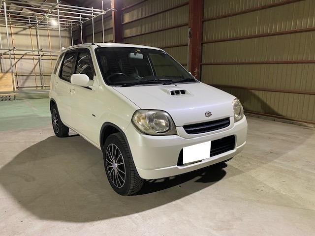 スズキ Ｋｅｉ ２１世紀記念スペシャルＥＸ　ターボ　走りの５速ＭＴ　シートヒーター　４ＷＤ　社外マフラー　社外ナビ　ＥＴＣ　ユーザー買取車　走行６万キロ台　キーレスエントリー　衝突安全ボディ