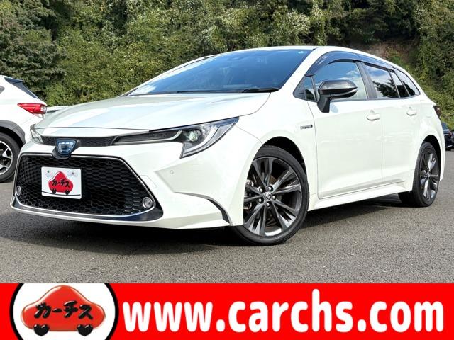 カローラツーリング(トヨタ) ハイブリッド ダブルバイビー 禁煙車!衝突被害軽減ブレーキ!アダプティブクルコン!純正ナビ!Bカメラ!BT!ETC2.0!オートライト!スマートキー&プッシュスタート!USB端子!LEDヘッドライト/デイライト!ブラインドSM! 中古車画像