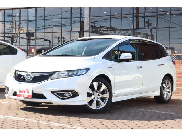 ジェイド(ホンダ) ハイブリッドＸ　走行距離無制限１年保証　車検整備付き　ホンダセンシング　ナビ　Ｂカメラ　ＡＷ　クルーズコントロール　スマートキ―　Ｐスタート　ＥＴＣ　ＬＥＤヘッドライト　３列シート 中古車画像