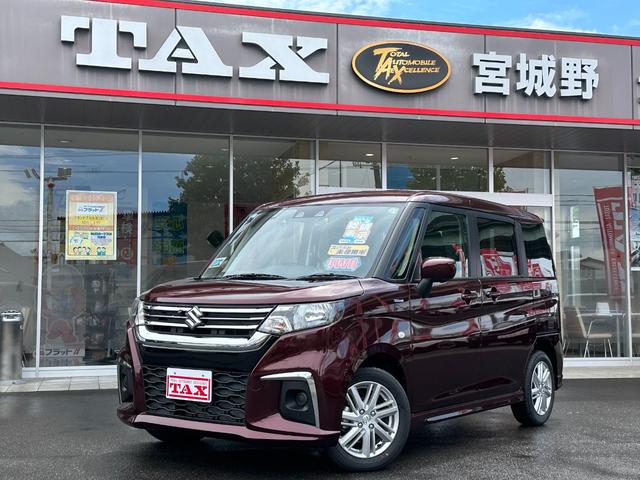 ハイブリッドＭＸ　登録済み未使用車　全方位モニターカメラパッケージ　純正フルセグナビ　４ＷＤ　左側パワースライドドア　Ｂｌｕｅｔｏｏｔｈ　スズキセーフティサポート装着車　シートヒーター　ＵＳＢ接続　オートエアコン
