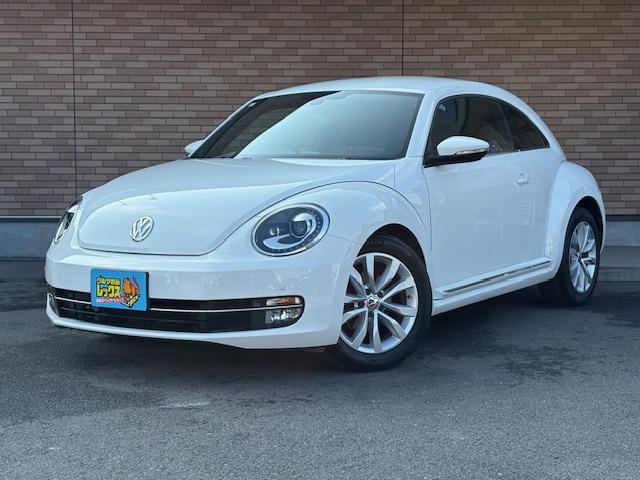 ザ・ビートル(フォルクスワーゲン) デザインレザーパッケージ　保証付　禁煙車　ターボ車　黒革シート　純正ナビ　フルセグ　Ｂモニター　Ｂｌｕｅｔｏｏｔｈ　シートヒーター　ＨＩＤ　コーナーセンサー　キーレス　パドルシフト　純正１７ＡＷ 中古車画像