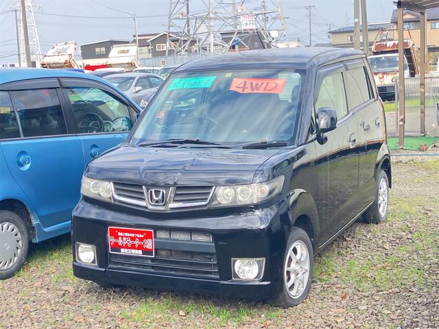 ゼストスパーク(ホンダ) Ｇ　４ＷＤ　ＥＴＣ　ＨＩＤ　スマートキー　ベンチシート　ＡＴ　盗難防止システム　ＡＢＳ　ＣＤ　ミュージックプレイヤー接続可　アルミホイール　衝突安全ボディ　エアコン　パワーステアリング　パワーウィンドウ 中古車画像