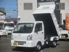 キャリイトラック 頑丈ダンプ 4WD車 高低速切替 ワンオーナー車 CDプレイヤー スタッドレスタイヤセット品付 新明和工業 電動油圧式 マレル式 強化リヤサス(リーフ4枚) 荷台側鳥居パネル型 リヤゲート自動開閉式 3方開ゲート 中古車画像