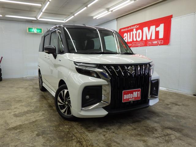 ハイブリッドＭＶ　４ＷＤ　スズキセーフティサポート　スズキコネクト対応９インチメモリーナビフルセグ　全方位カメラ　ＨＵＤ　レーダークルーズ　両側パワスラ　Ｆ左右シートヒーター　ミラーヒーター　ＥＳＰ　登録済未使用車