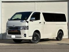 ハイエースバン スーパーGL ダークプライムII 4WD ディーゼルターボ トヨタセーフティセンス LEDヘッドライト 社外15インチAW ホワイトレタータイヤ TRDエアロ 純正ナビ バックカメラ 両側パワースライドドア ETC スマートキー 中古車画像