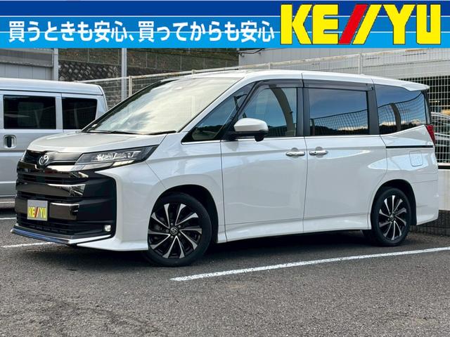 ノア(トヨタ) Ｓ−Ｚ【大阪府仕入】【プレミアムサウンドシステム】【禁煙車】　【１０．５型ディスプレイ／１４型フリップダウンモニター】【前後ドラレコ連動デジタルインナーミラー】【両側電動スライドドア】【追従クルコン／車線逸脱警告】【ハーフレザー／シートヒーター】【ＥＴＣ２．０】 中古車画像