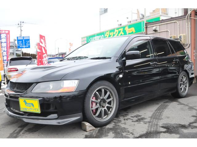 ランサーワゴン エボリューションＧＴ　修復歴無し／６ＭＴ／車高調／Ｄｉｆｉリンク／ＲＥＣＡＯＲＯシート／強化クラッチ／タイベル交換済み／カーボン製フロントスポイラー／地デジＳＤナビ／ＥＴＣ／キーレス／４Ｇ６３（1枚目）