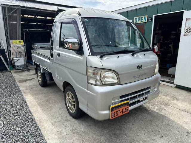 ハイゼットトラック ジャンボ　車検整備Ｒ／９／１０　ジャンボ　ＡＴ　４ＷＤ　ナビ　ワンセグ　エアコン　パワステ　パワーウインドウ　キーレス（1枚目）