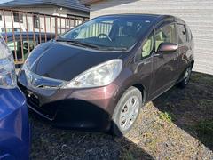 フィットハイブリッド ハイブリッド・10thアニバーサリー ETC ナビ オートクルーズコントロール スマートキー 電動格納ミラー CVT 盗難防止システム 衝突安全ボディ CD DVD再生 ABS ESC エアコン パワーステアリング 中古車画像