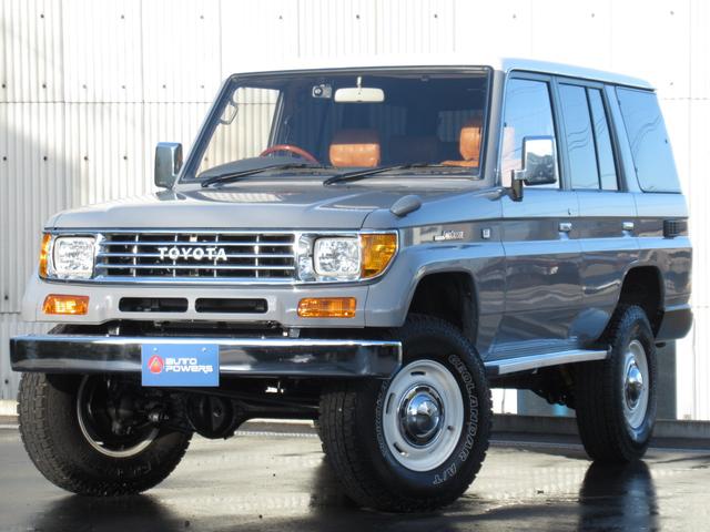 ランドクルーザープラド(トヨタ) ＳＸナローボディー　リフトアップ　ナルディーステアリング　ＤＥＡＮ１６インチホイール　ヨコハマジオランダータイヤ　オレンジコーナーレンズ　オレンジウインカー　３色ＥＤＬテール　メッキグリル　ブラウン色シートカバー　ストラーダナビ　フルセグ　バックカメラ 中古車画像