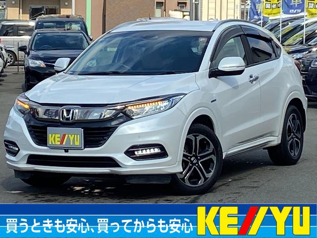 ヴェゼル(ホンダ) ハイブリッドZ・ホンダセンシング 禁煙車 フルエアロ 衝突軽減装置 車線逸脱警告 追従クルーズコントロール コーナーセンサー バックカメラ シートヒーター盗難防止装置 純正8インチナビ フルセグ&BLUETOOTH&CDDVD 純正ドラレコ 電動シート 中古車画像