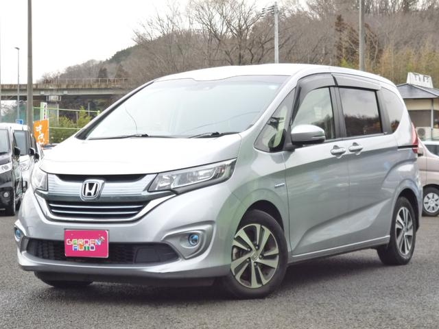 フリードハイブリッド(ホンダ) ハイブリッド・Ｇホンダセンシング　純正ナビ　フルセグＴＶ　後席モニター　バックモニター　両側電動ドア　ドラレコ前後 中古車画像