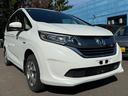フリード＋ハイブリッド ４ＷＤ　ハイブリッドＧ・ホンダセンシング　ＣＤ／ＤＶＤ、ＥＴＣ、ＴＶワンセグ、衝突被害軽減システム、キーレスエントリー、スマートキー、アイドリングストップ、ＨＩＤオートライト、レーンアシスト、Ｂｌｕｅｔｏｏｔｈ接続（1枚目）