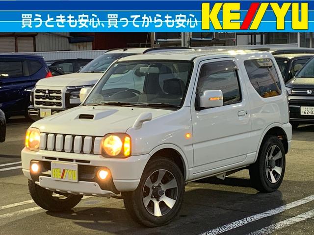 ジムニー(スズキ) クロスアドベンチャーＸＣ　４ＷＤ■寒冷地仕様■　メモリーナビ／ＣＤ／ワンセグＴＶ／ＥＴＣ／ハーフレザーシート／シートヒーター／電動格納ミラー／ヘッドライトレベライザー／ハロゲンヘッドライト／フォグ／純正アルミ 中古車画像