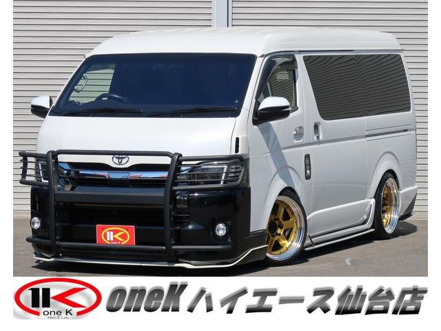 ハイエースワゴン ＧＬ　ワンオーナー　ＲＥＶＯシート　ベッドキット　車中泊・キャンパー仕様　ローダウン＆ＬＳＤ　フルエアロ　ＫＵＨＬ　ＥＳＳＥＸ　ＴＳＤ　玄武　ＢＡＲＯＮＥ１９インチ２ピースＡＷ　ネオチューン（1枚目）