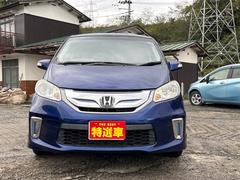 フリードハイブリッド ジャストセレクション ETC バックカメラ ナビ TV オートクルーズコントロール 両側電動スライドドア HID スマートキー アイドリングストップ 電動格納ミラー 3列シート ウォークスルー CVT アルミホイール CD 中古車画像