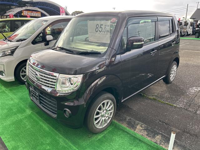 モコ(日産) ドルチェX FOUR 4WD ETC ナビ TV オートライト HID スマートキー アイドリングストップ 電動格納ミラー シートヒーター ベンチシート CVT 盗難防止システム ABS CD DVD再生 USB 中古車画像