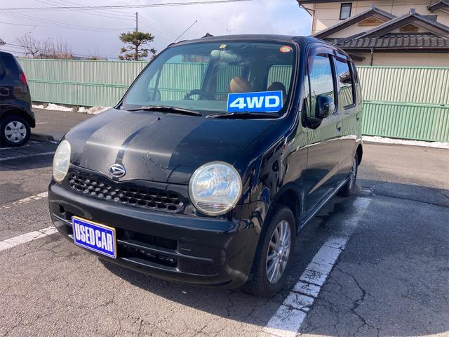 X 4WD キーレスエントリー 電動格納ミラー ベンチシート AT 盗難防止システム ABS CD MD アルミホイール 衝突安全ボディ エアコン パワーステアリング(1枚目)