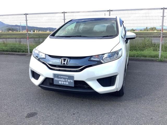 フィット １３Ｇ・Ｆパッケージ　４ＷＤ　横滑り防止装置　ＥＴＣ　アルミホイール　スマートキー　アイドリングストップ　メモリーナビ　バックカメラ　フルセグ（1枚目）