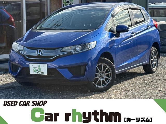 フィットハイブリッド(ホンダ) Ｌパッケージ　４ＷＤ　ハイブリッド　バックカメラ　ＴＶ　オートクルーズコントロール　オートライト　ＬＥＤヘッドランプ　スマートキー　アイドリングストップ　電動格納ミラー　ＡＴ　盗難防止システム　衝突安全ボディ 中古車画像