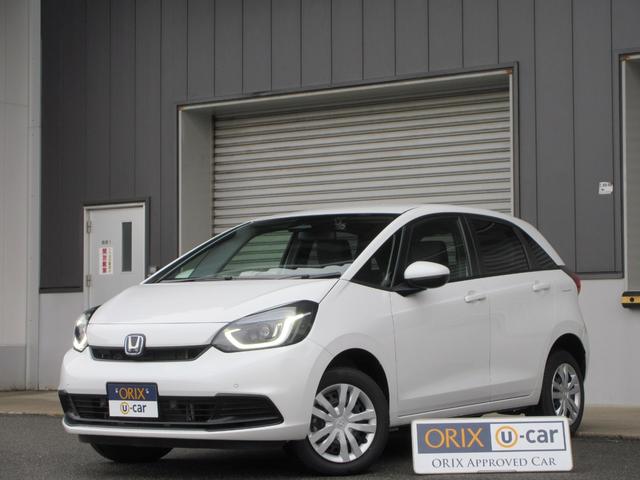 フィット(ホンダ) ｅ：ＨＥＶベーシック　４ＷＤ　ＥＴＣ　バックカメラ　クリアランスソナー　ナビ　Ｂｌｕｅｔｏｏｔｈ　ＵＳＢ　レーダークルーズコントロール　衝突被害軽減システム　ＬＥＤヘッドライト　ワイパーデアイサー　ドライブレコーダー 中古車画像