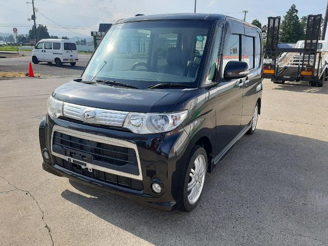 タント(ダイハツ) カスタムＸスペシャル　ＡＴ　４ＷＤ　ナビ　ＴＶ　左パワースライド　ＨＩＤ 中古車画像