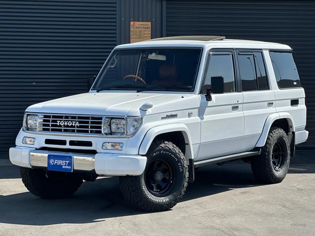 ランドクルーザープラド(トヨタ) ＥＸワイド　４ＷＤ　サンルーフ　ナビ　ＴＶ　キーレスエントリー　ＡＴ 中古車画像