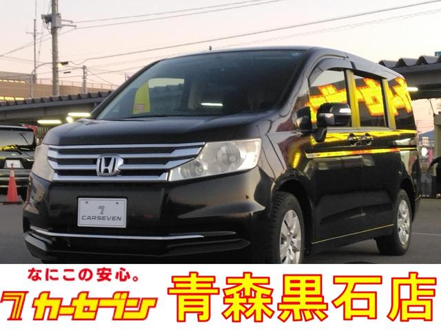 ステップワゴン(ホンダ) Ｇ　Ｅセレクション　４ＷＤ　ＥＴＣ　ナビ　ＴＶ　両側電動スライドドア　スマートキー　アイドリングストップ　電動格納ミラー　後席モニター　３列シート　ＣＶＴ　ＣＤ　ＤＶＤ再生　ＵＳＢ　Ｂｌｕｅｔｏｏｔｈ　盗難防止システム 中古車画像