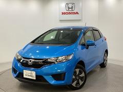 フィットハイブリッド Fパッケージ 4WD 光触媒抗菌消臭施工済 ETC 純正メモリーナビ フルセグTV Bluetooth バックカメラ ステアリングスイッチ キーレスエントリー スマートキー アイドリングストップ 盗難防止システム 中古車画像