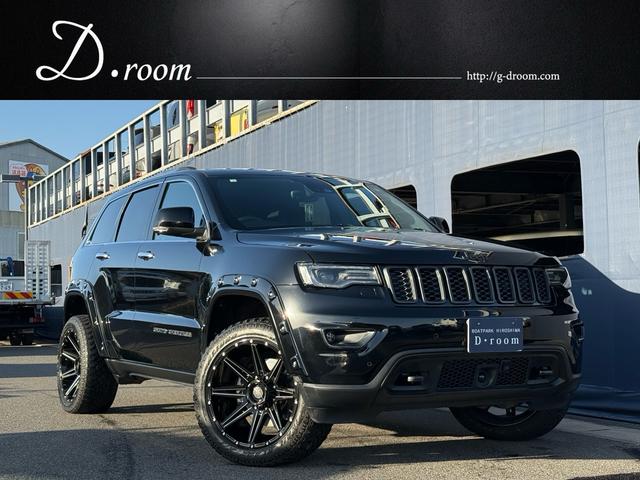 ジープ・グランドチェロキー(ジープ) リミテッド　２０インチＡＷ　オーバーフェンダー　エアサス　アダプティブクルーズコントロール　黒革シート　パワーシート　シートヒーター　　バックカメラ　クリアランスソナー　純正ナビ　フルセグＴＶ　Ｂｌｕｅｔｏｏｔｈ 中古車画像