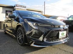 カローラツーリング ハイブリッド ダブルバイビー モデリスタエアロ TRD18インチAW 純正ディスプレイオーディオ トヨタセーフティセンス レーダークルーズコントロール バックカメラ ステアリングヒーター ハーフレザーシート シートヒーター 中古車画像