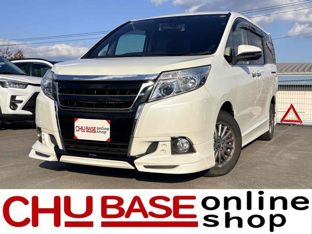 エスクァイア(トヨタ) ハイブリッドＧｉ　ワンオーナー／禁煙車／１２ヶ月保証／ナビ／ＵＳＢ／Ｂｌｕｅｔｏｏｔｈ／スマートキー／フルセグＴＶ／シートヒーター／奥置くだけ充電／後席サンシェード 中古車画像