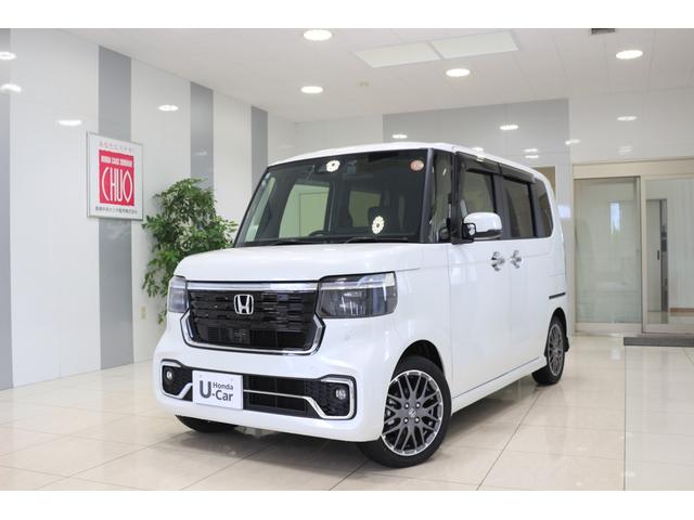 Ｎ－ＢＯＸカスタム ターボ　ホンダセンシング　横滑り防止装置　前後ドライブレコーダー　ナビ　バックカメラ　ＥＴＣ　充電用ＵＳＢジャック　両側パワースライドドア　シートヒーター　クルーズコントロール　アルミホイール　スマートキー（1枚目）