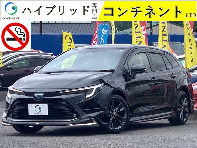 トヨタ カローラツーリング ハイブリッド　ダブルバイビー　ワンオーナー　禁煙車　純正ナビ　フルセグ　Ｂｌｕｅｔｏｏｔｈ　バックモニター　モデリスタ　ツィーター　レーダークルーズ　ＥＴＣ２．０　シートヒーター　ハーフレザー　ステアヒーター　ＡＣ１００Ｖ　ＡＷ