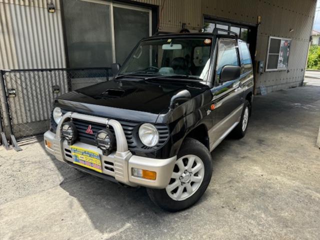 三菱 パジェロミニ アイアンクロスＶ　４ＷＤ　ルーフレール　ＡＴ　修復歴なし　アルミホイール　背面タイヤあり　ブラック／シルバーツートンカラー　パワーステアリング　パワーウインドウ　エアコン